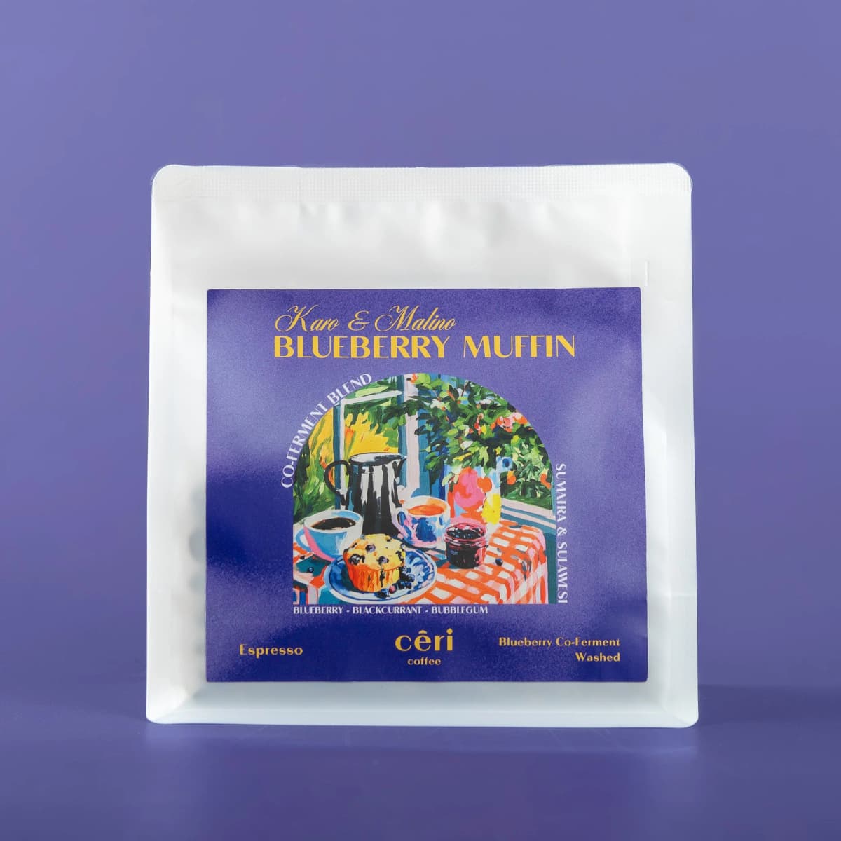 Ceri Coffee co-ferment package with a colorful label on a purple background